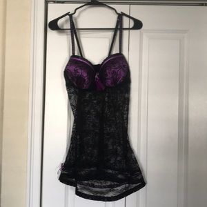 Black lace lingerie, purple accents/ stitching.